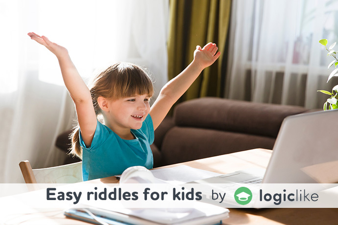 happy girl solving easy riddles for kids